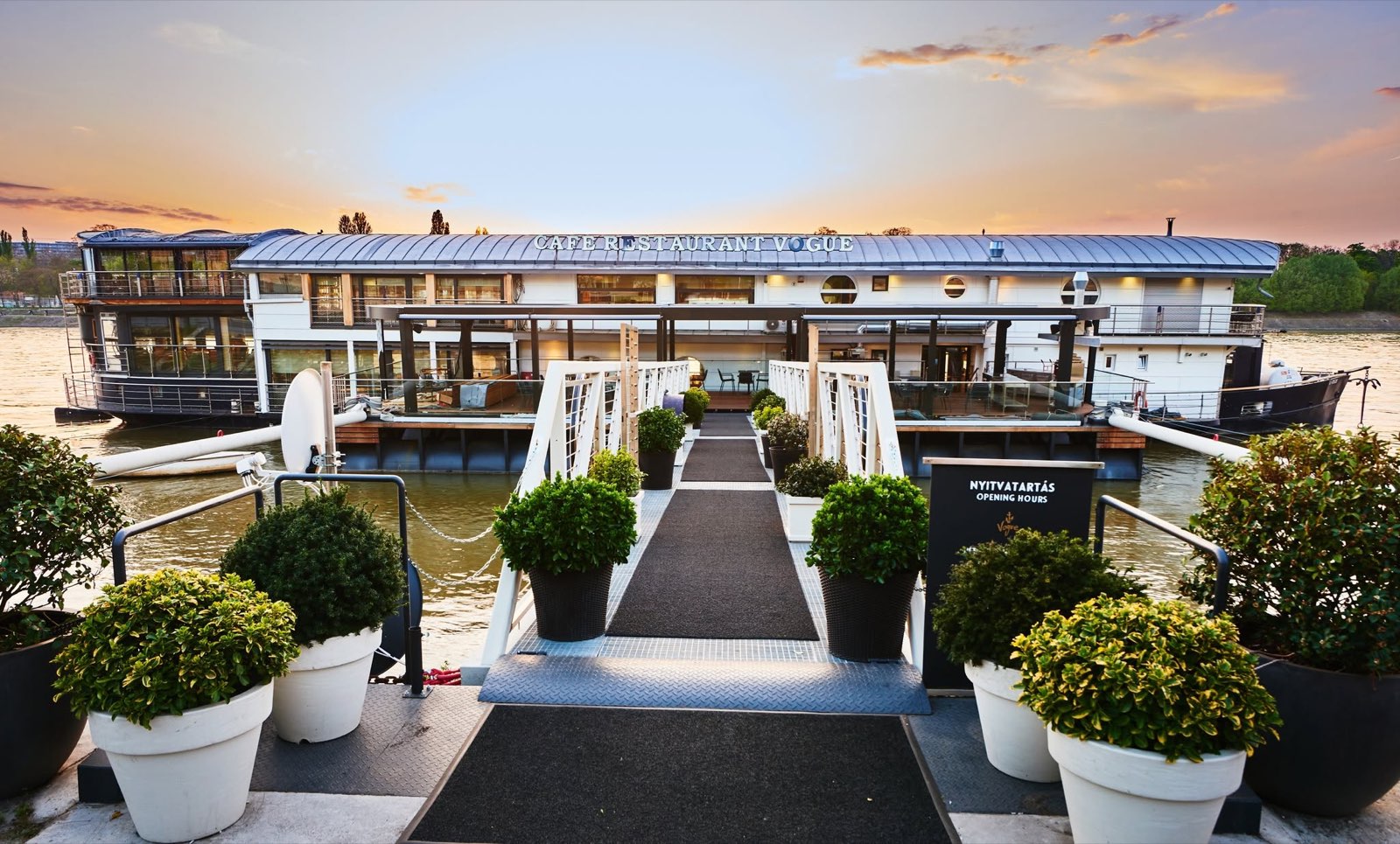 The entrance and gangway seen from the embankment at sunset