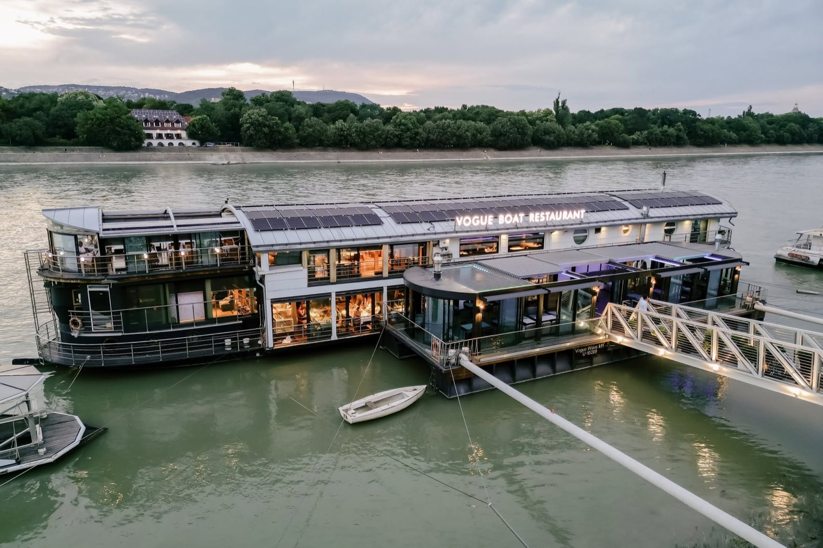 Vogue Boat Restaurant seen from the Danube at dusk